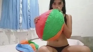 Blowing beach ball