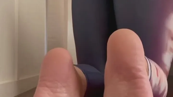 Close up barefoot sole tease in yoga pants