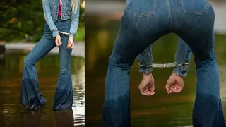 Locked up walking through water in my flared denim jeans